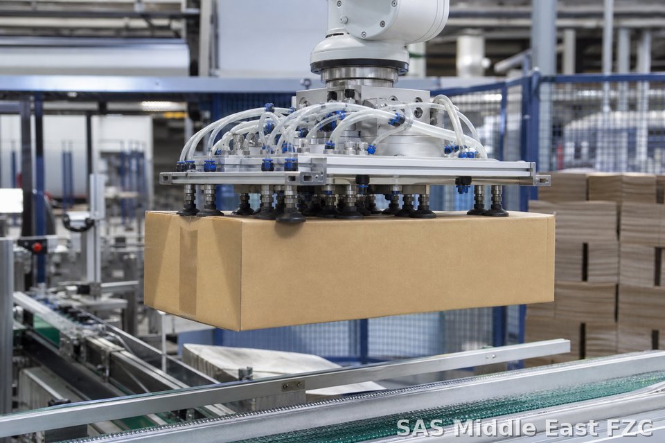 Multi-cup vacuum EOAT lifting cartons on packaging line — representative packaging application